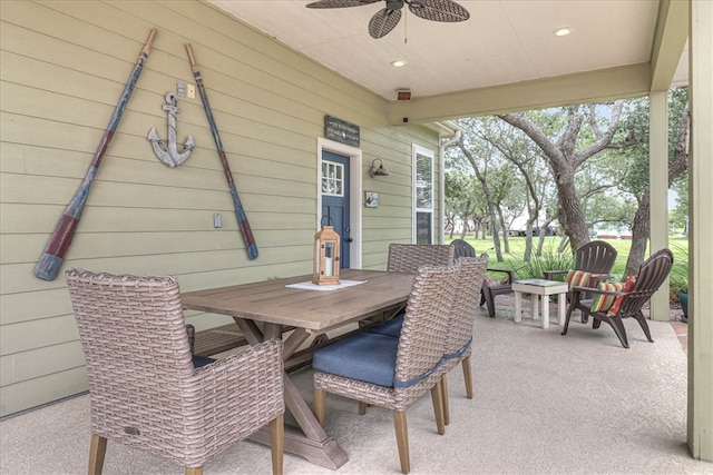 view of patio featuring ceiling fan