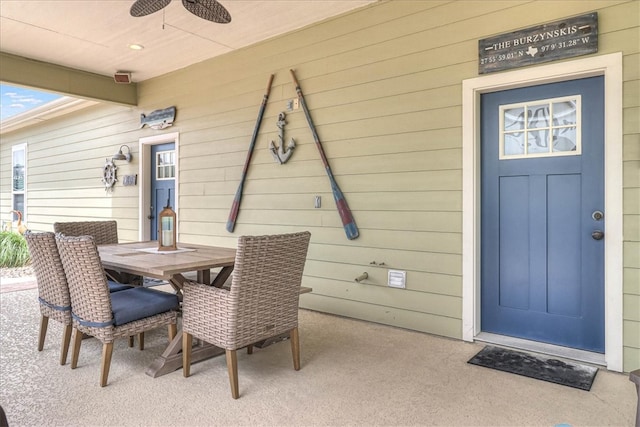 exterior space featuring ceiling fan