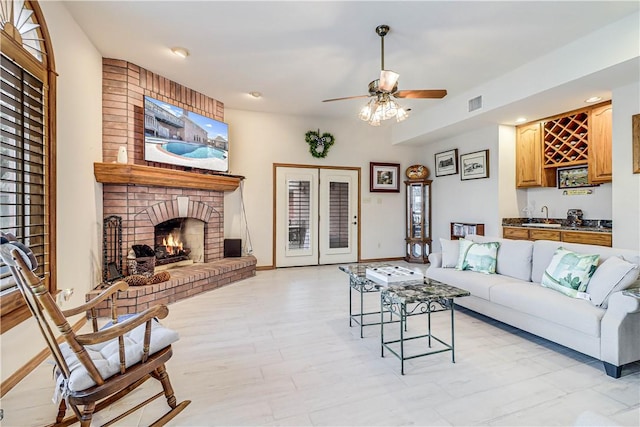441 Colony Dr, Corpus Christi, TX 78412 - living room featuring indoor wet bar, ceiling fan, visible vents, and plenty of natural light
