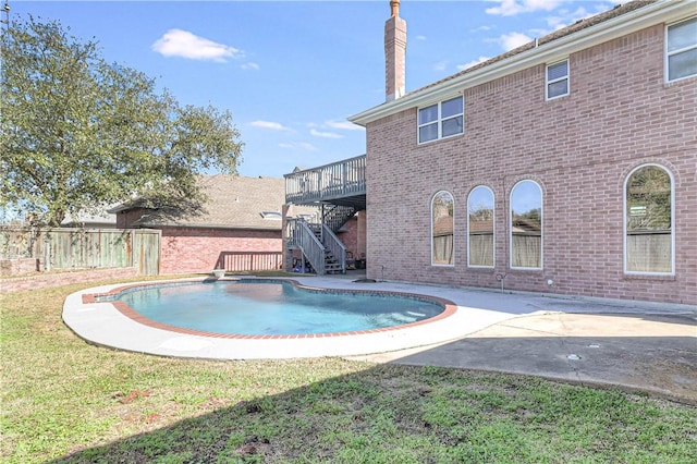 441 Colony Dr, Corpus Christi, TX 78412 - view of pool with a wooden deck, fence, a fenced in pool, a patio, and stairs