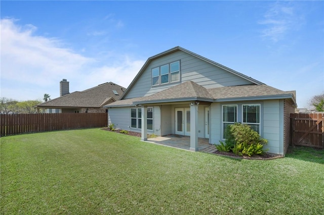 420 Palmer Dr, Portland, TX 78374 - back of property with french doors, a shingled roof, and a patio area