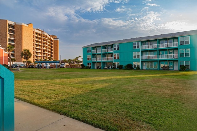 view of community featuring a yard