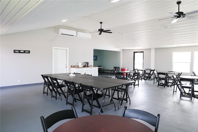 dining room with wood ceiling, lofted ceiling, concrete floors, and an AC wall unit