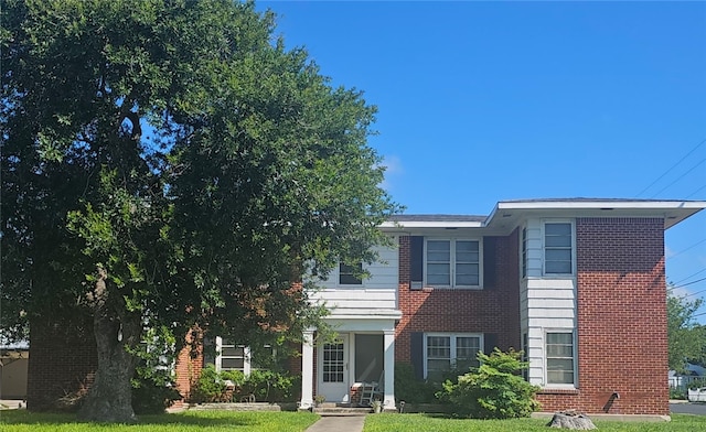 253 Leming Ave, Corpus Christi, TX 78404 - view of front of property featuring a front yard and brick siding
