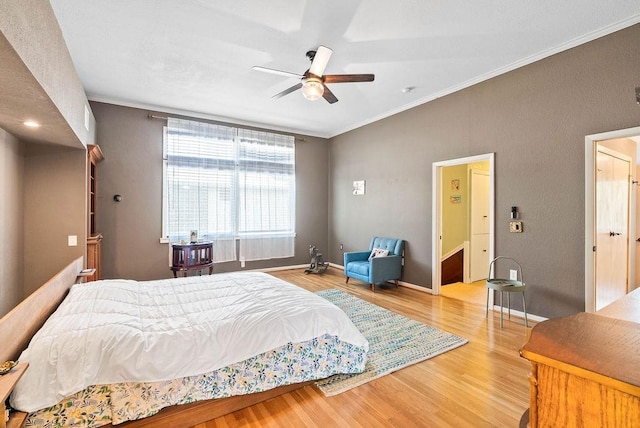256 Melrose St, Corpus Christi, TX 78404 - bedroom with wood finished floors, crown molding, and a ceiling fan