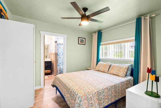 256 Melrose St, Corpus Christi, TX 78404 - bedroom featuring multiple windows, wood finished floors, and a ceiling fan