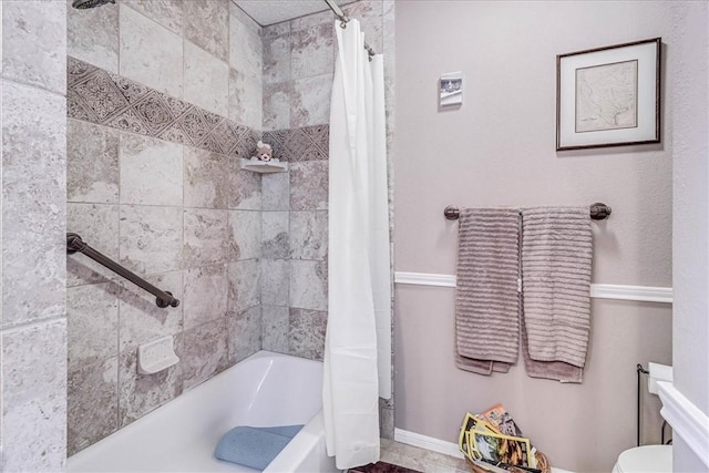 bathroom with shower / bathtub combination with curtain