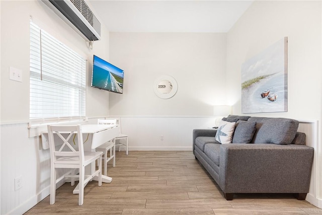 living room with light hardwood / wood-style floors