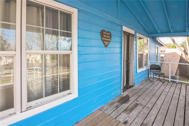 wooden terrace featuring a porch