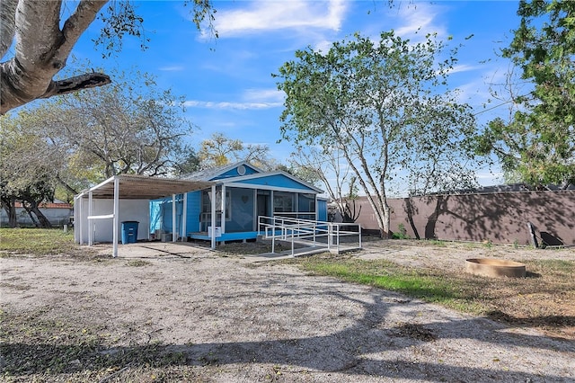 view of front facade featuring a carport