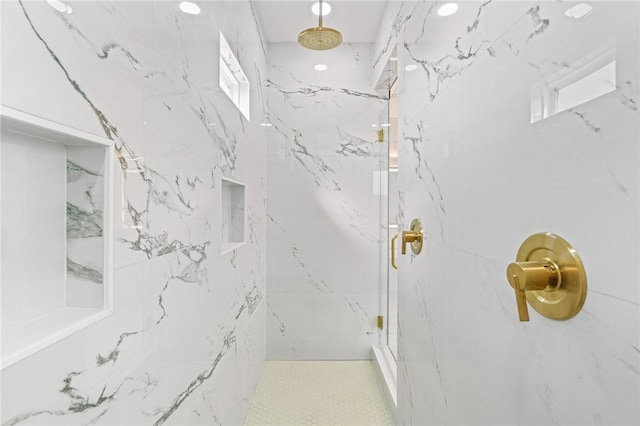 full bath with a marble finish shower