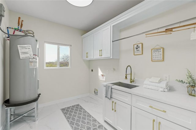 laundry area featuring water heater, cabinet space, electric dryer hookup, marble finish floor, and a sink