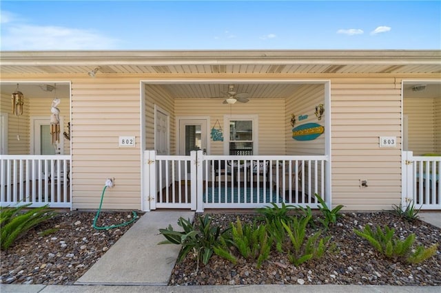 entrance to property with ceiling fan