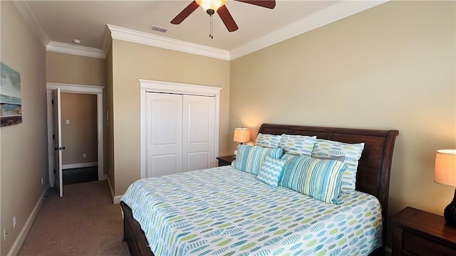 14890 Granada Dr Unit 107, Corpus Christi, TX 78418 - bedroom featuring carpet, crown molding, a closet, baseboards, and a ceiling fan