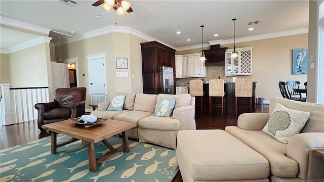 14890 Granada Dr Unit 107, Corpus Christi, TX 78418 - living area with ceiling fan, dark wood-style floors, recessed lighting, and crown molding
