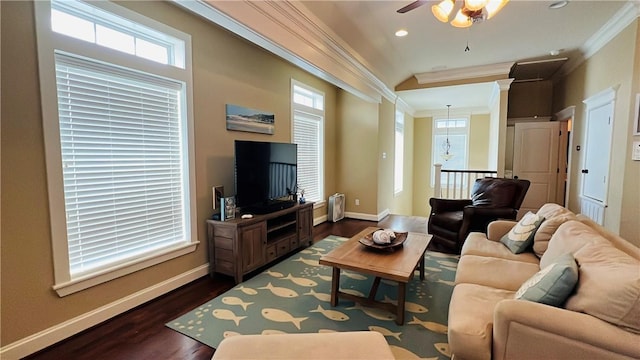 14890 Granada Dr Unit 107, Corpus Christi, TX 78418 - living room with ornamental molding, dark wood-style flooring, healthy amount of natural light, ceiling fan, and baseboards