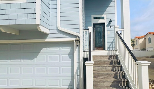 14890 Granada Dr Unit 107, Corpus Christi, TX 78418 - view of exterior entry featuring an attached garage