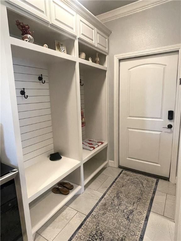 mudroom with crown molding