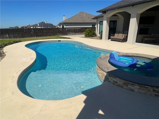 view of swimming pool with a patio area, a fenced backyard, and a fenced in pool