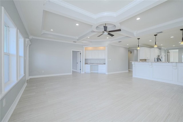 unfurnished living room with ceiling fan, ornamental molding, coffered ceiling, and light hardwood / wood-style floors