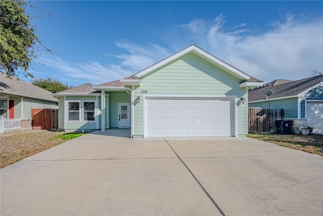 single story home featuring a garage