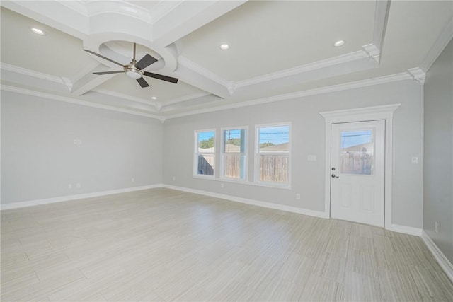 interior space featuring beam ceiling, ornamental molding, coffered ceiling, and ceiling fan