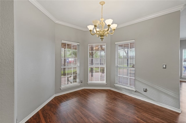 7705 Jacinto, Corpus Christi, TX 78413 - unfurnished dining area with a chandelier, dark wood-style floors, healthy amount of natural light, and ornamental molding