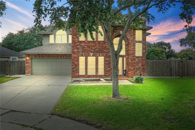 7705 Jacinto, Corpus Christi, TX 78413 - traditional home with concrete driveway, a garage, and brick siding
