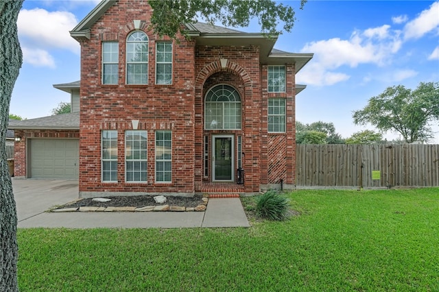 7705 Jacinto, Corpus Christi, TX 78413 - traditional home featuring driveway, an attached garage, and brick siding