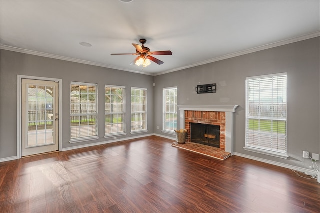 7705 Jacinto, Corpus Christi, TX 78413 - unfurnished living room featuring ceiling fan, wood finished floors, a fireplace, and crown molding