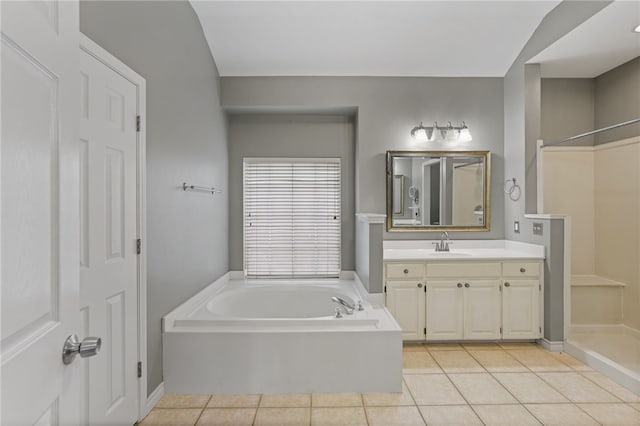 7705 Jacinto, Corpus Christi, TX 78413 - bathroom with tile patterned floors, vanity, a bath, and a walk in shower