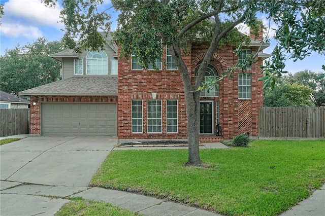 7705 Jacinto, Corpus Christi, TX 78413 - traditional-style home featuring an attached garage, concrete driveway, brick siding, and roof with shingles