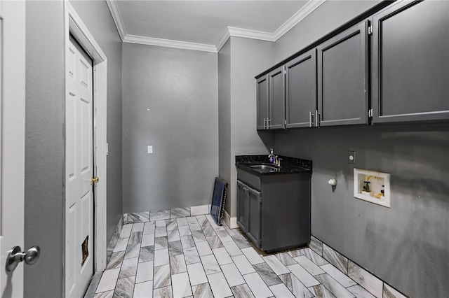 7705 Jacinto, Corpus Christi, TX 78413 - laundry room featuring cabinet space, washer hookup, ornamental molding, hookup for an electric dryer, and light marble finish floors