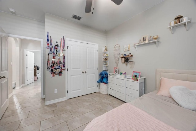4009 Yankees Pl, Corpus Christi, TX 78414 - bedroom with light tile patterned floors, a closet, and a ceiling fan