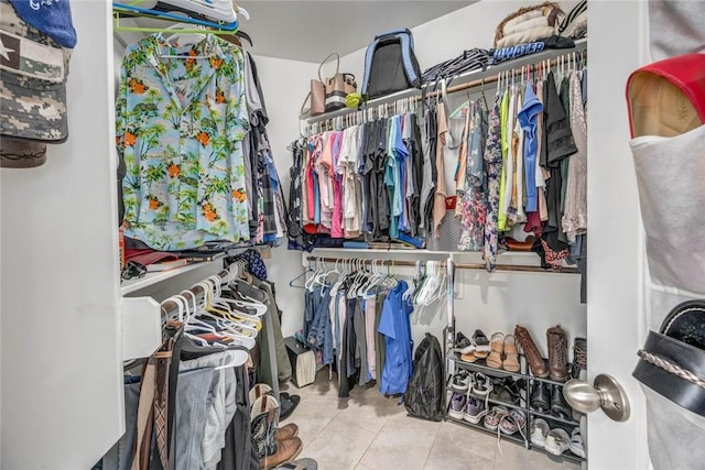 4009 Yankees Pl, Corpus Christi, TX 78414 - walk in closet with tile patterned flooring