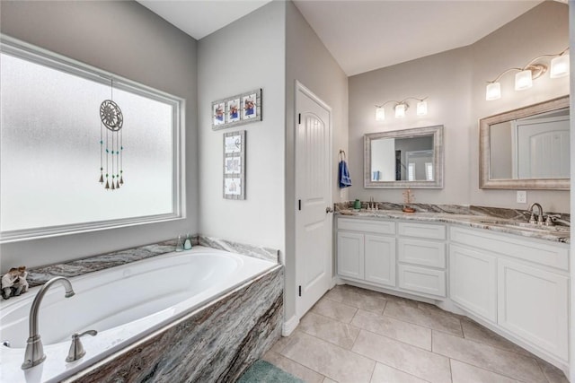 4009 Yankees Pl, Corpus Christi, TX 78414 - full bath with double vanity, a bath, and tile patterned floors