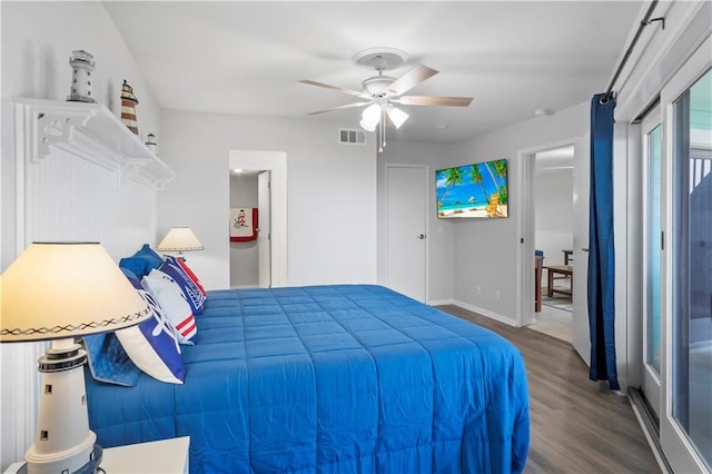 bedroom with wood-type flooring and ceiling fan