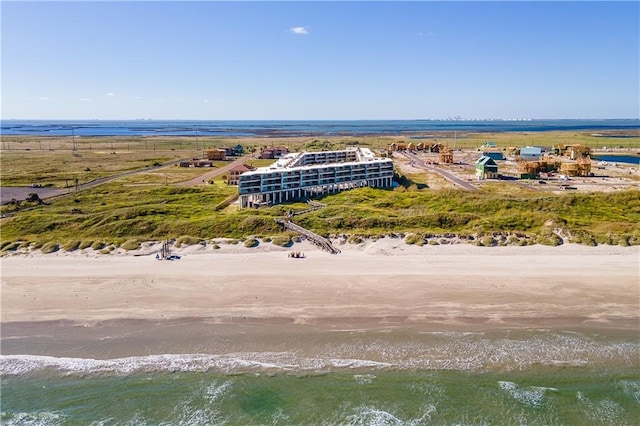 drone / aerial view with a view of the beach and a water view