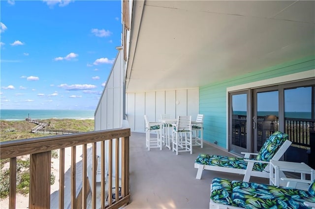 balcony featuring a water view