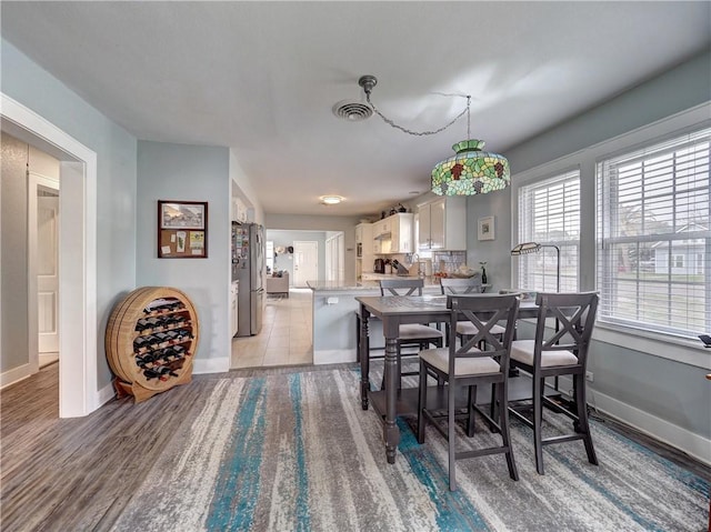 341 W Greenwood Ave, Aransas Pass, TX 78336 - dining area with baseboards