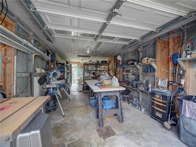 341 W Greenwood Ave, Aransas Pass, TX 78336 - garage featuring a workshop area