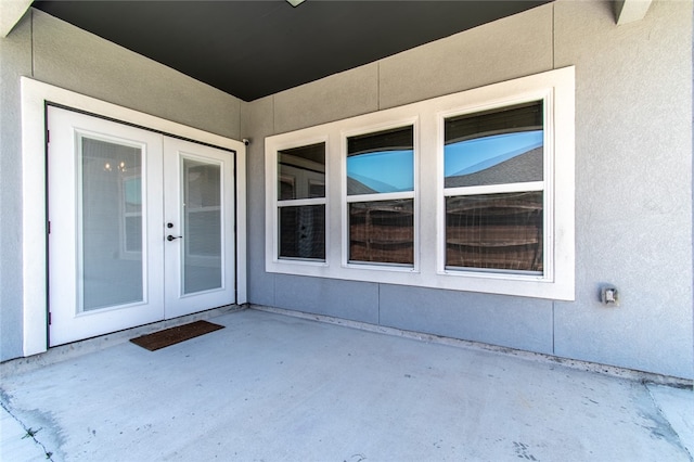 doorway to property with french doors and a patio area