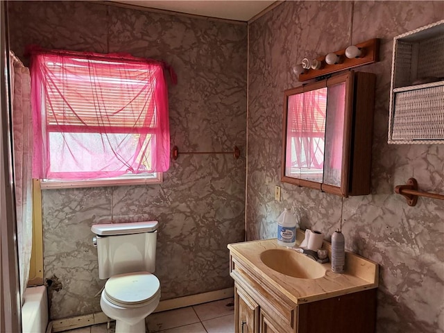 4721 Molina Dr, Corpus Christi, TX 78416 - full bath with plenty of natural light, vanity, tile patterned flooring, and a tub to relax in