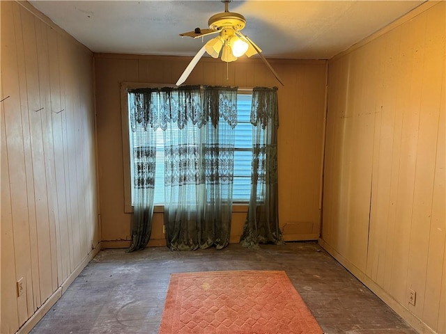 4721 Molina Dr, Corpus Christi, TX 78416 - spare room featuring ceiling fan and wooden walls