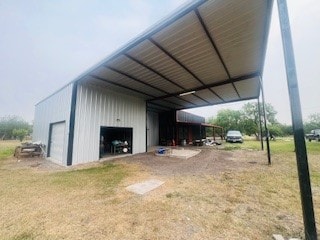 view of outdoor structure with a carport