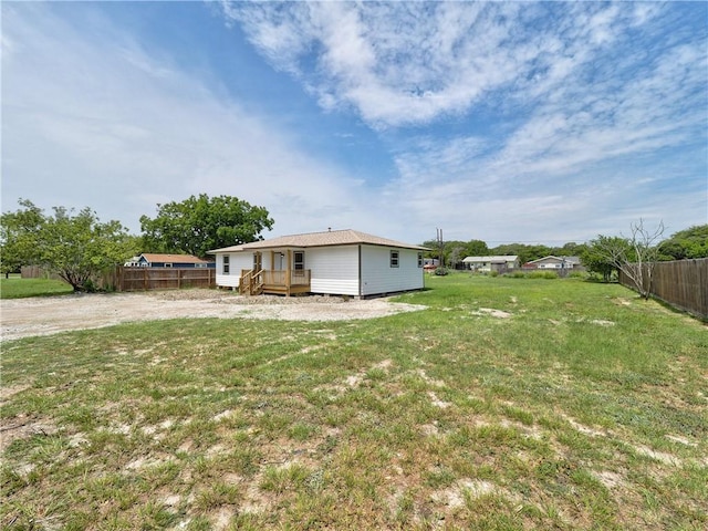 222 N 9th St, Aransas Pass, TX 78336 - view of yard featuring a deck