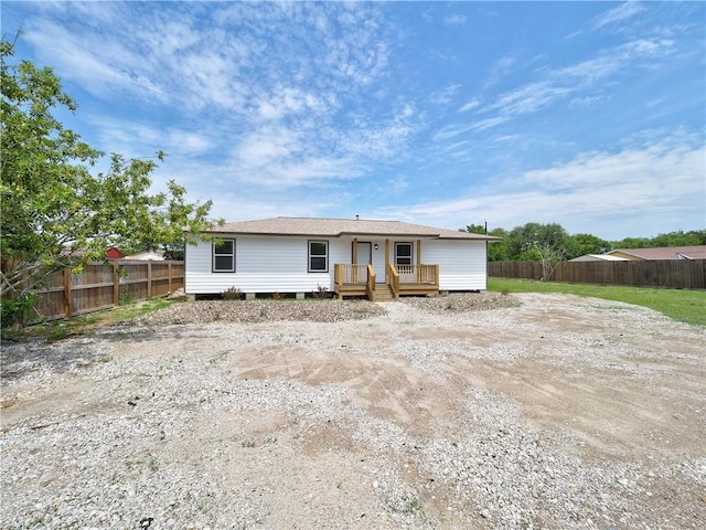 222 N 9th St, Aransas Pass, TX 78336 - view of front of home with a deck