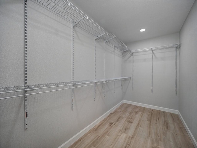 222 N 9th St, Aransas Pass, TX 78336 - spacious closet with wood finished floors