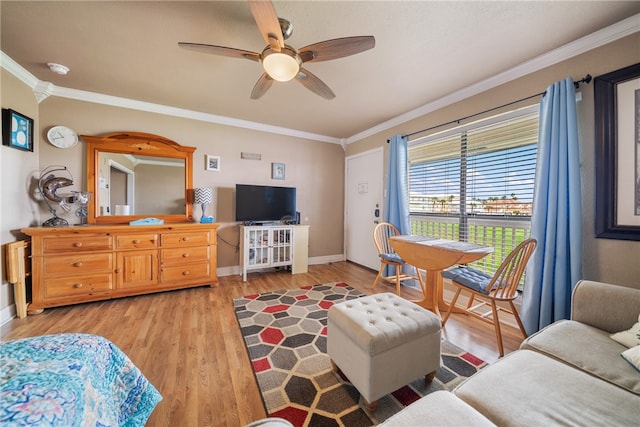 living room with ceiling fan, light hardwood / wood-style flooring, and ornamental molding