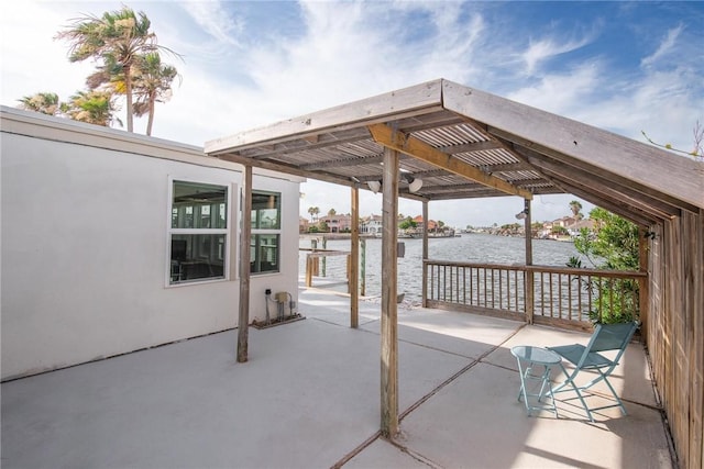 13765 Eaglesnest Bay Dr, Corpus Christi, TX 78418 - view of patio featuring a pergola and a water view